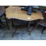 Rectangular shaped occasional table with a dark circular oak coffee table on turned support on 4