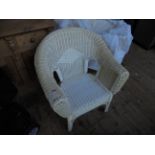 Large oval backed white painted Lloyd Loom chair