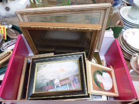 Box of small picture and photograph frames together with a selection of figurines, wall tiles etc.