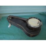 Banjo in black carrying case