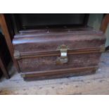 Brass bound brown travelling tin trunk