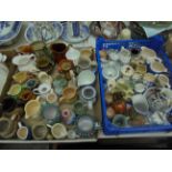 Collection within 2 trays of miniature cream jugs, vases etc.