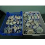 2 trays of miniature and larger sized Delft clogs together with small plates, ashtrays etc.