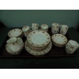 Most decorative coloured garland white ground early 20th century bone china 12 place setting part