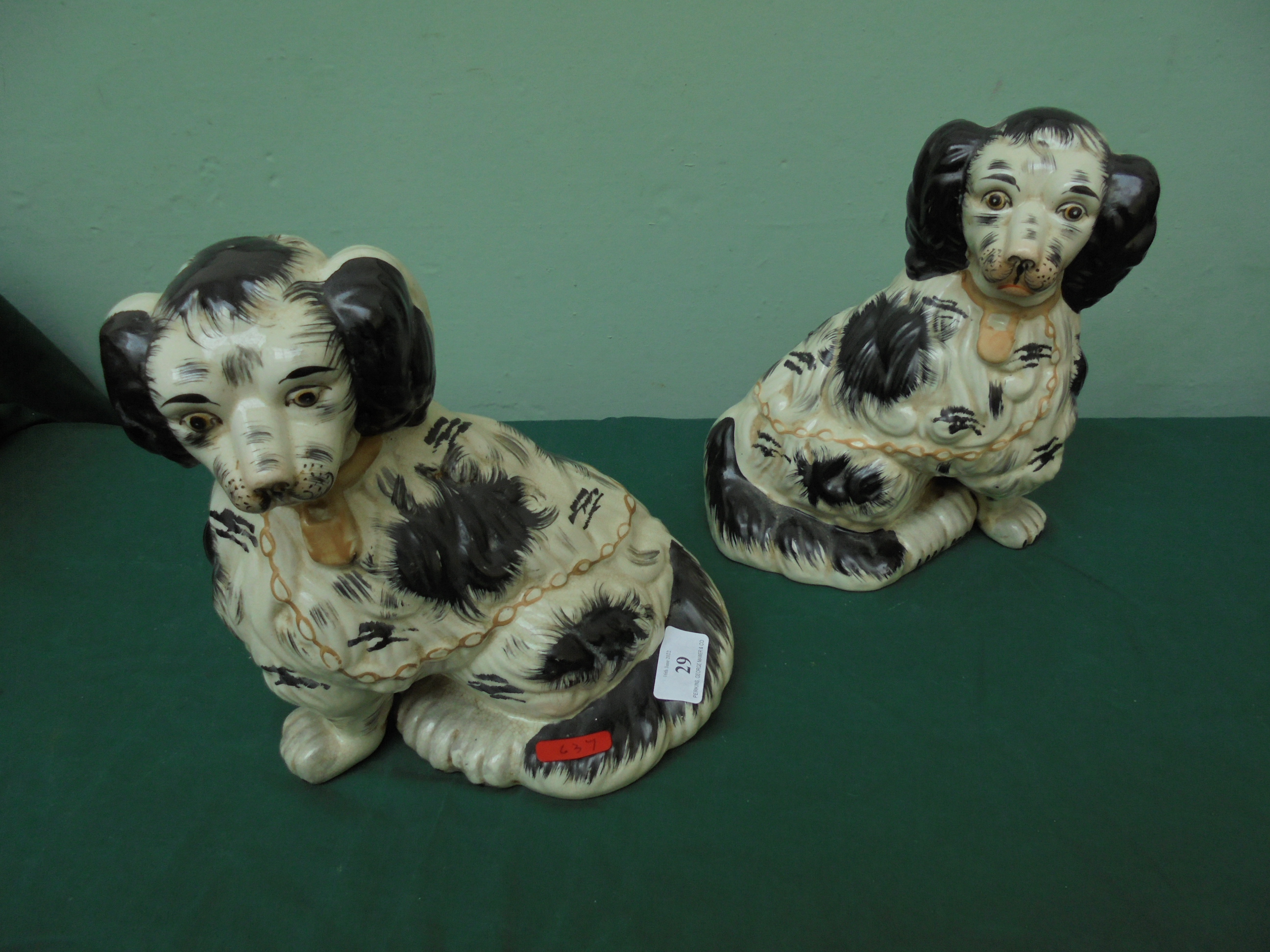 Pair of large black and white Spaniel male and female mantlepiece ornaments