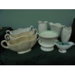 8 large white ground boat shaped handled and tulip shaped flower vases from various popular