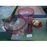 Pair of Cranberry decorative dessert glasses with raised decoration of a young piper,