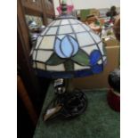 Modern brass table lamp with decorative Tiffany style coloured patterned domed shade