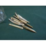 Bag of vintage mother of pearl and bone game markers