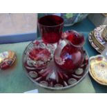 Cranberry glass dressing table dish, ruby glass handled jug,