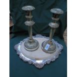 Oval bread board together with a pair of plated candlesticks