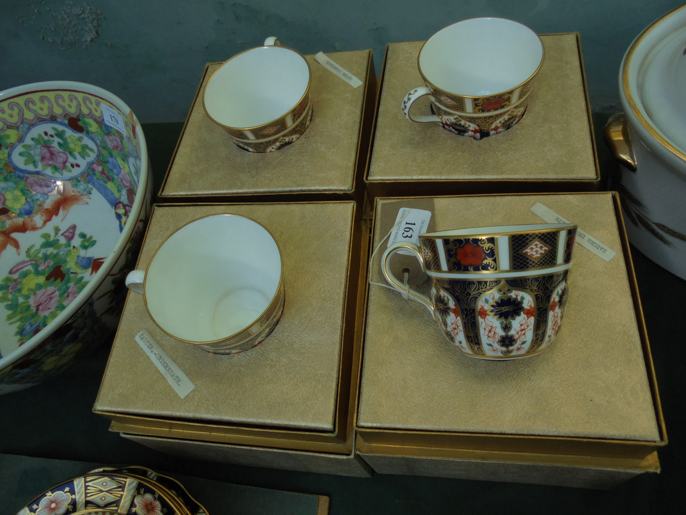 4 unused Royal Crown Derby teacups and saucers,