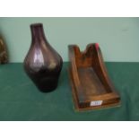 Wooden single wine bottle holder with purple vase