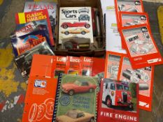 Two boxes of transport related books, automatic parts catalogue etc.