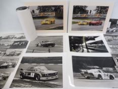 A quantity of black and white photographs of motor sport, bearing copyright stamp from Peter