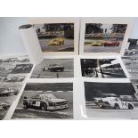 A quantity of black and white photographs of motor sport, bearing copyright stamp from Peter