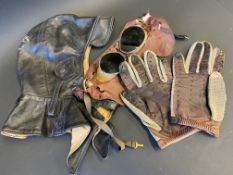 A Retro-Pilot leather flying/racing helmet, a pair of driving gloves and a pair of goggles.