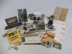 A quantity of motoring collectables, badges, keyrings etc.