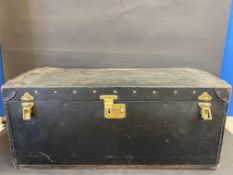 A Brooks trunk, with a shallow domed rising lid, and lift up inner lid, 32" w x 14" h x 18" d.