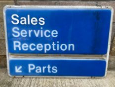 A large garage showroom plastic sign for Sales, Service, Reception and Parts.