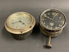 A Smiths black faced eight day car clock, bottom wind, plus a silver faced eight day car clock.