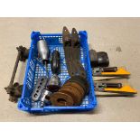 A crate of assorted parts including two new trafficators, cut-outs, wing brackets, shock absorber