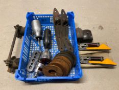 A crate of assorted parts including two new trafficators, cut-outs, wing brackets, shock absorber