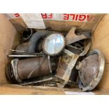 A box of assorted spare parts including dynamos, an exterior rear view mirror etc.