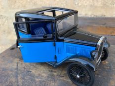 A small model of an Austin 7 box saloon.