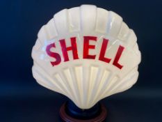 A 'Fat' Shell glass petrol pump globe, in good condition, fully stamped underneath 'Property of