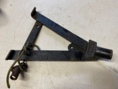 A Pennant two gallon petrol can running board bracket.