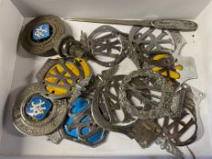 A selection of AA and RAC badges, a BSA badge and a Vulcan letter opener.