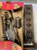 An AC 2 litre cylinder head with camshaft, valves and rockers etc, damaged casting.