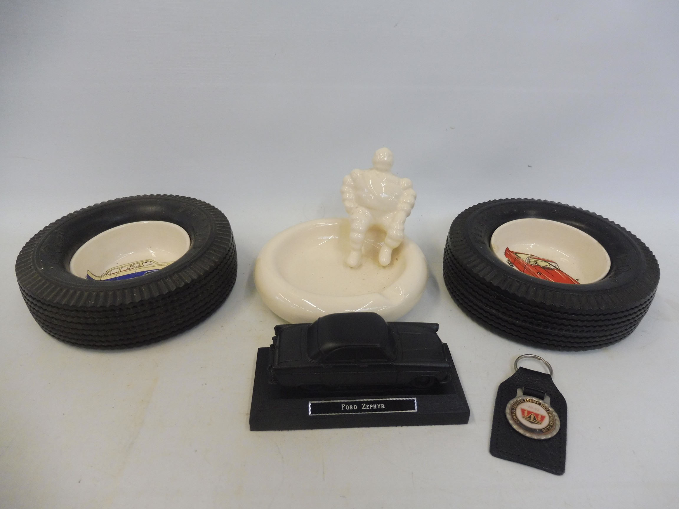 Two rarely seen ceramic and rubber tyre ashtrays advertising the Ford Zodiac and the Zephyr, plus