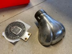 A Morris Bullnose Club badge plus an exhaust end piece.