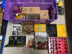 A large box of assorted washers, split pins, and other workshop items.