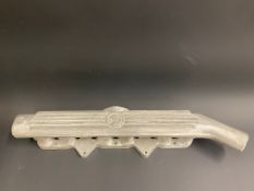 A reproduction MG aluminium manifold.