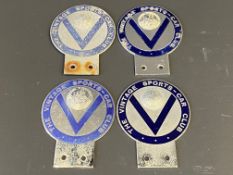 Four VSCC badges including an earlier painted version.