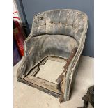 A Veteran or Edwardian bucket seat with original upholstery, lacking squab.