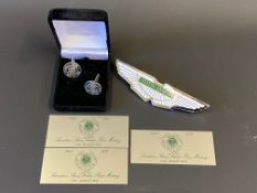 A pair of commemorative Bentley Driver's Club cufflinks from the 1980s tour of South Africa, under