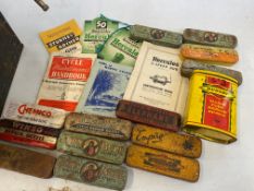 A collection of cycle puncture repair kit tins, various cycling ephemera and advertising, tools