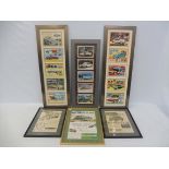 A selection of framed and glazed advertisements for various marques including Hillman Minx, VW