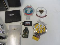 A selection of Jaguar badges and insignia including a leaper and a Driver's Club badge, various