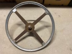 A 21" four spoke steering wheel with an alloy rim.