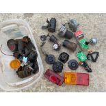 A box of electrical fittings, switches, lenses etc.