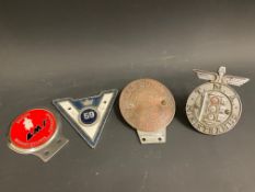 A Douglas Motor Cycle Club badge and three others.