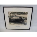 A framed and glazed photograph by Alan Smith of Stirling Moss in the Cooper-Alta, 18 x 15 3/4".