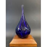 A Shell promotional blue glass centrepiece engraved with the Shell logo, made by Dartington,
