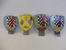 Three BARC badges and a British Racing & Sports Car Club badge.