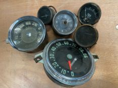 A CAV ammeter, two others, a Veglia fuel water and oil gauge, a 0-90mph speedometer and a Kienzle
